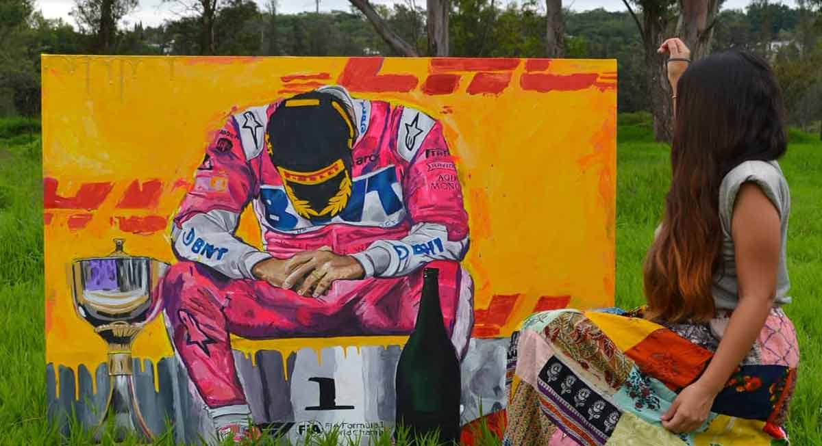 checo pérez recibe pintura de fanática que se hizo viral al pintarlo